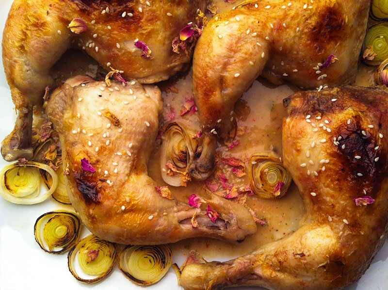 Chicken and salsa with leeks and rose petals