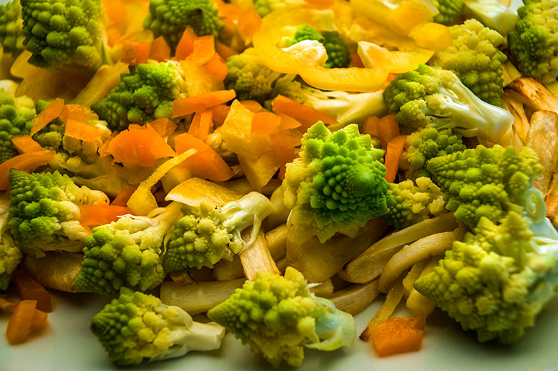 Parsnips , romanesco broccoli and raw sweet peppers